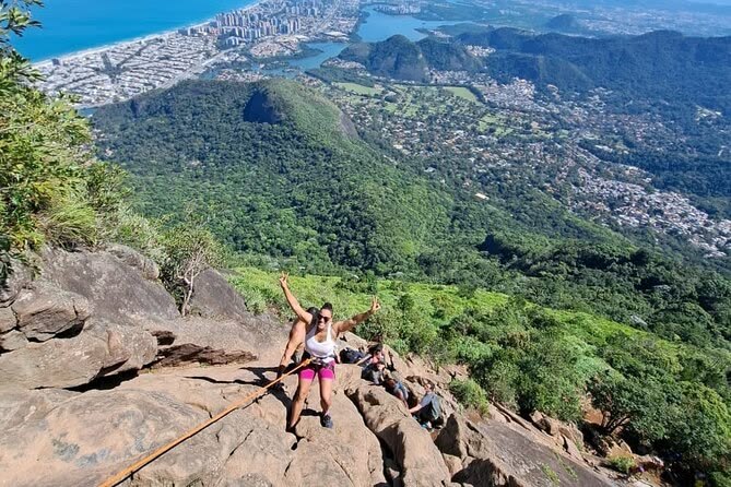 Hikers on the rocky Pedra da Gávea route