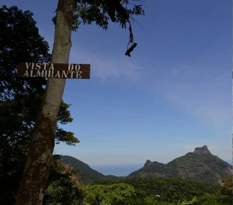 Vista do Almirante sign with Tijuca National Park mountains in the background
